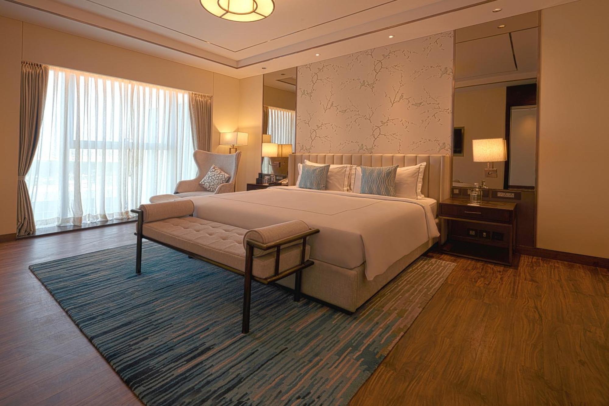 فندق تاج بانجالور دافانهالي المظهر الخارجي الصورة A bedroom at the hotel