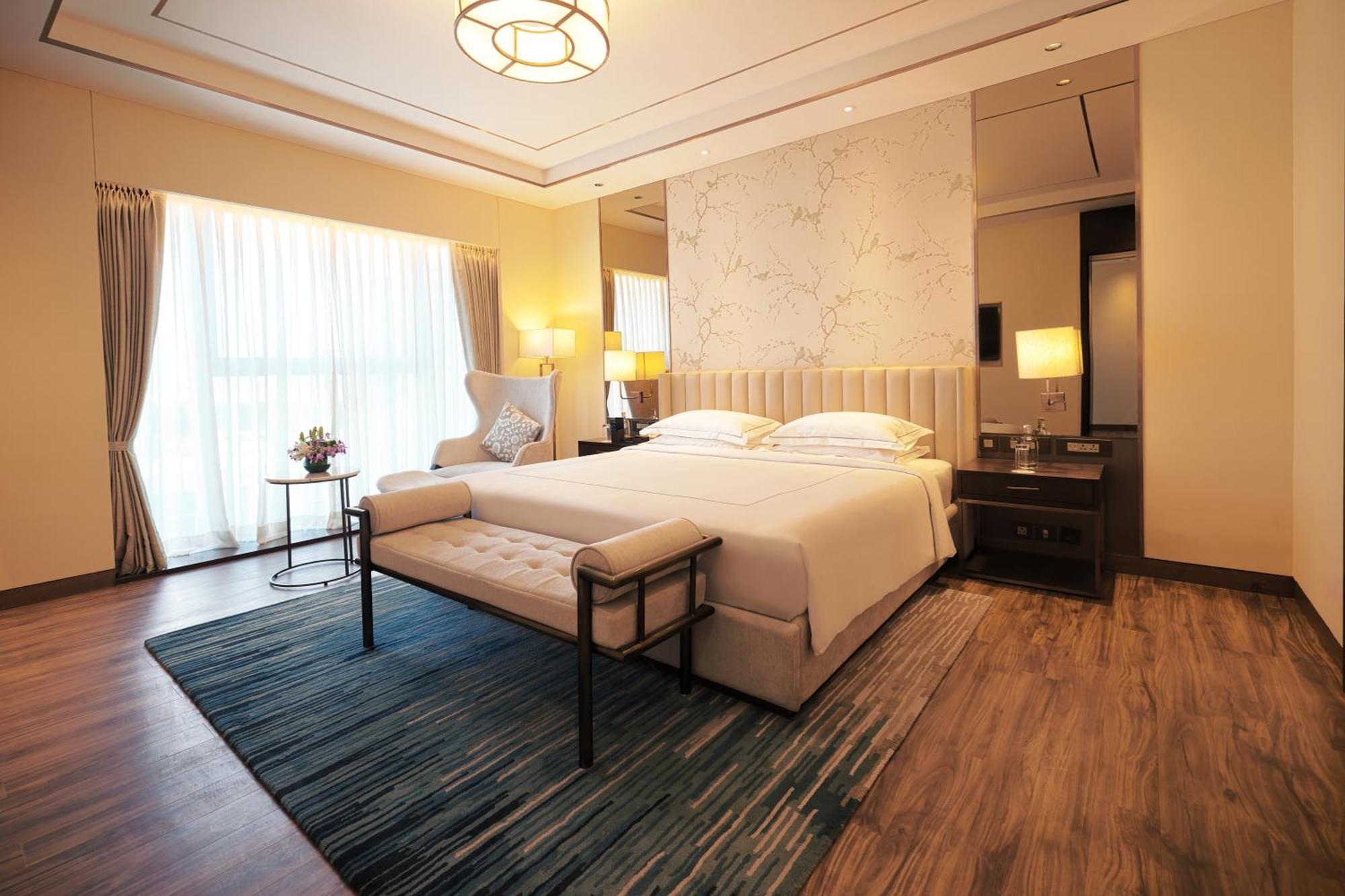 فندق تاج بانجالور دافانهالي المظهر الخارجي الصورة A bedroom at the hotel