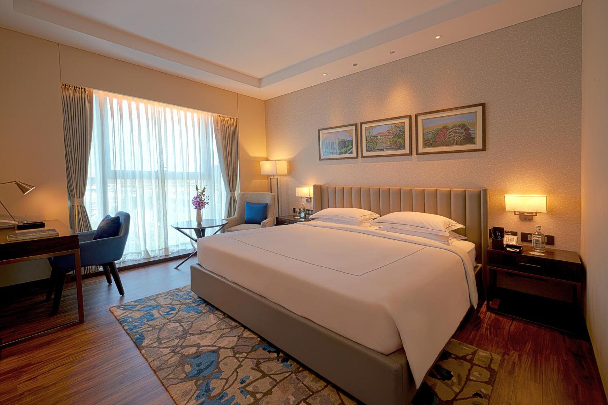 فندق تاج بانجالور دافانهالي المظهر الخارجي الصورة A bedroom at the Taj Bengal